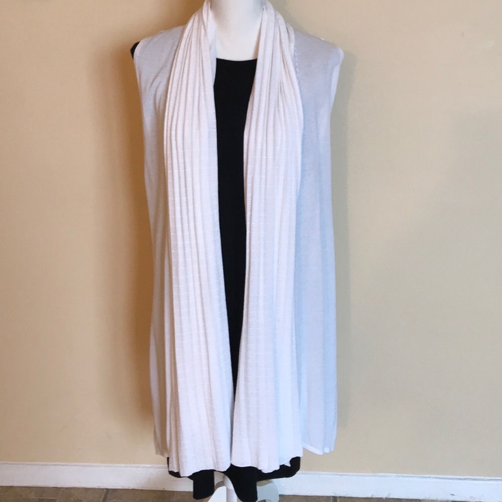 A white sleeveless cardigan